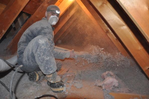 Blown cellulose insulation being applied to a Frankfort, IL home attic by Assured Insulation Solutions, LLC