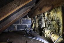 dirty attic kneewall insulation