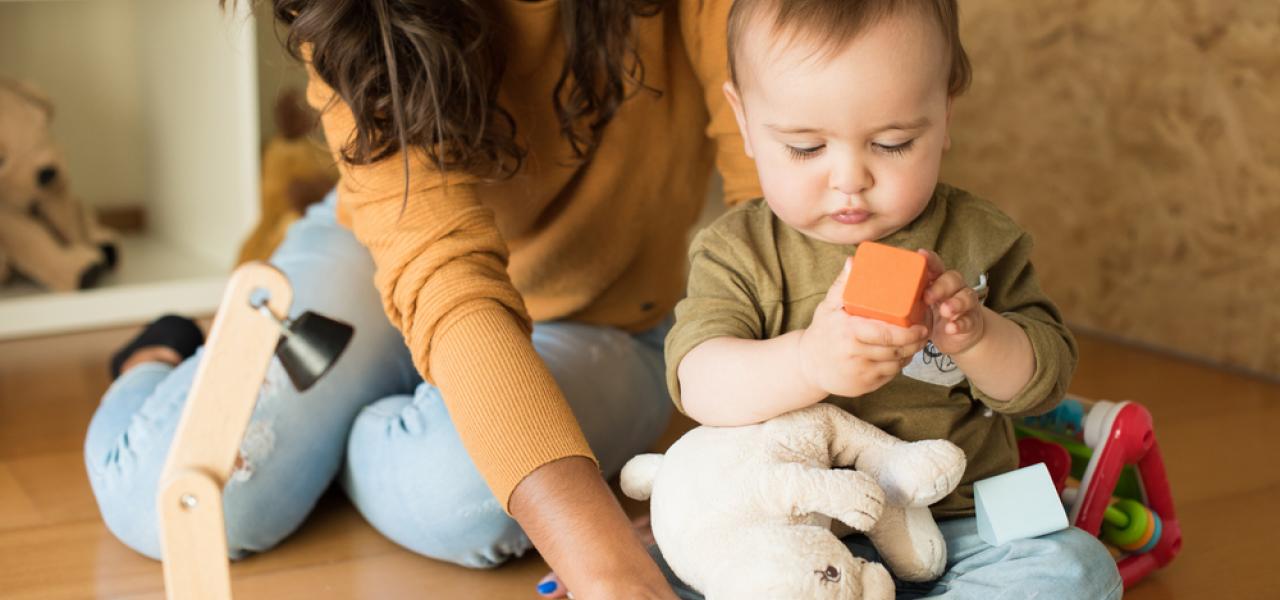 mother and child playing together at home