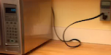Microwave cord plugged in which is using energy even though the machine is not in use