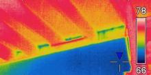 Infrared image showing heat loss through wall cavities
