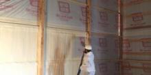 Spray foam being applied inside of a pole barn by Assured Insulation Solutions LLC