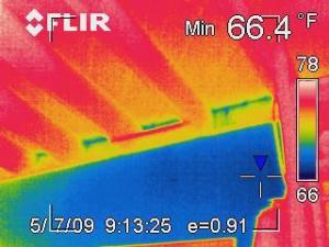 Infrared image showing heat loss through wall cavities